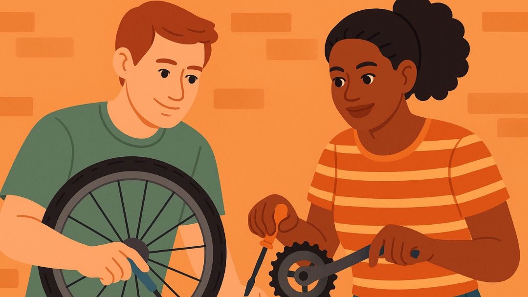 Two people repairing bike together showing how ISTP personality types connect through hands-on activities.