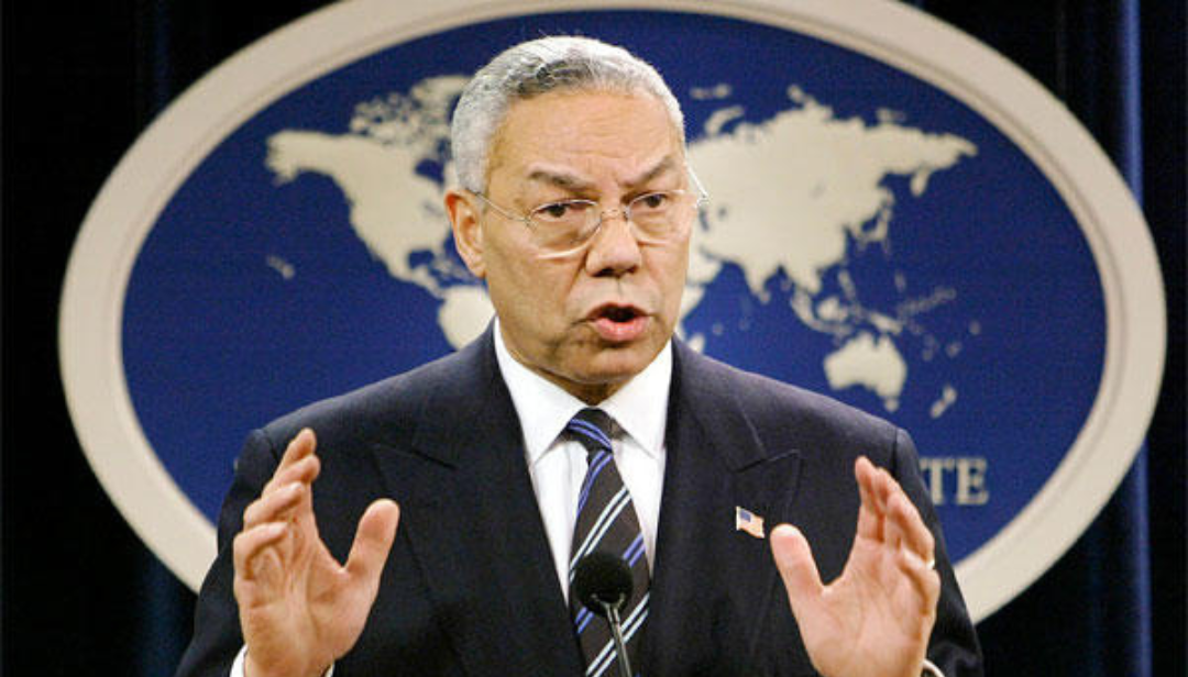Colin Powell speaking at podium showing famous ESFJ military and political leader who led with vision, empathy, and dedication.