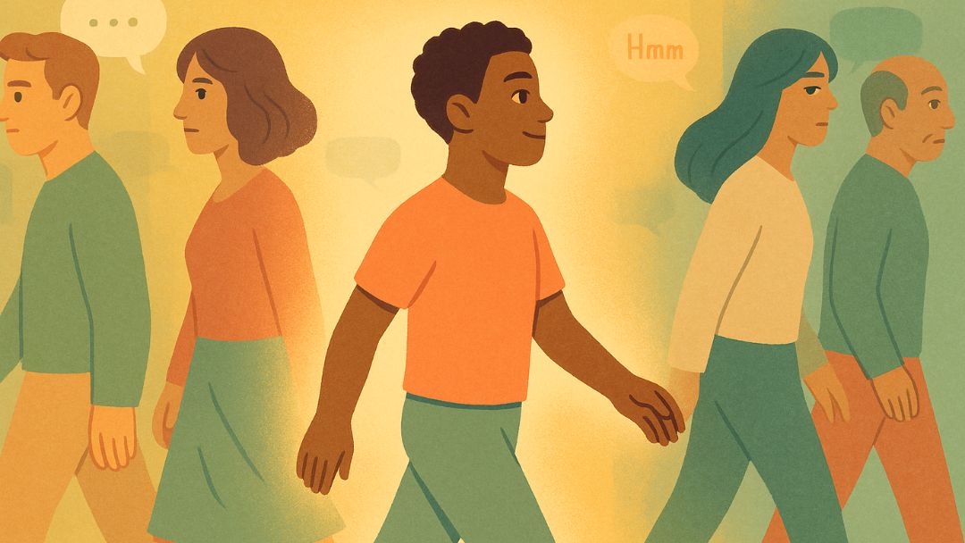 Man confidently not taking things personally while others talk around him.